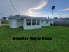 3225 Jarvis St. Holiday, FL 34690 - Back_1efcdd341cb22ad02c5e09afcf099363