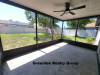 1305 Calamondin Dr. Holiday, FL 34691 - Porch1_d439cd33aa8cd946fd15f7372e557f79